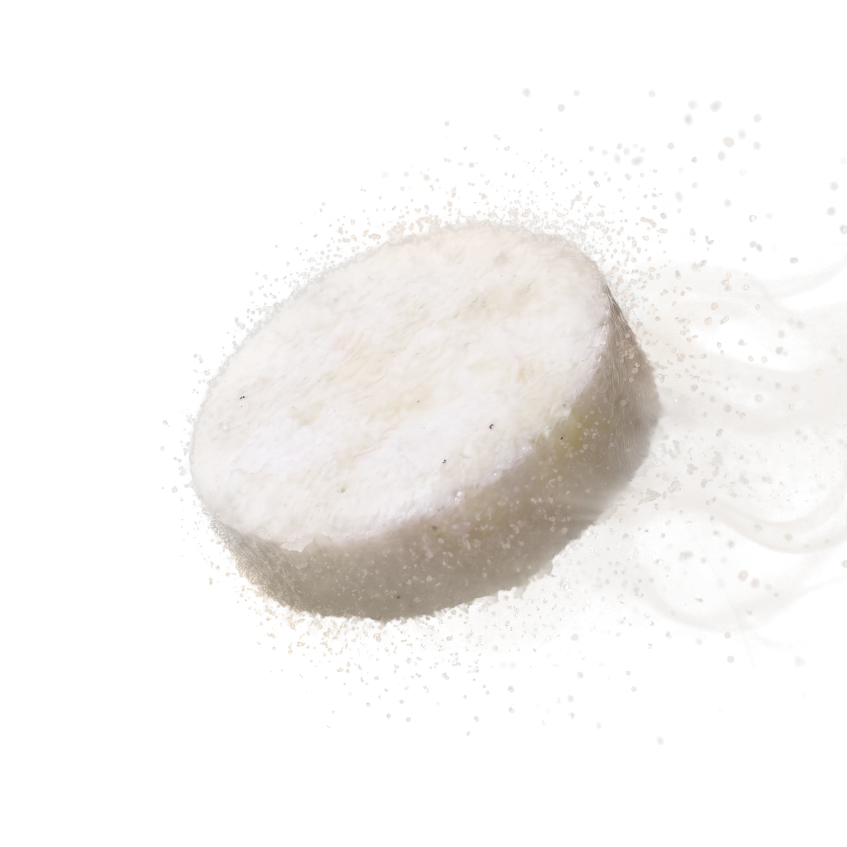 bluu cleanions Reinigungsperle beginnt sich aufzulösen, feine Partikel rieseln herab.